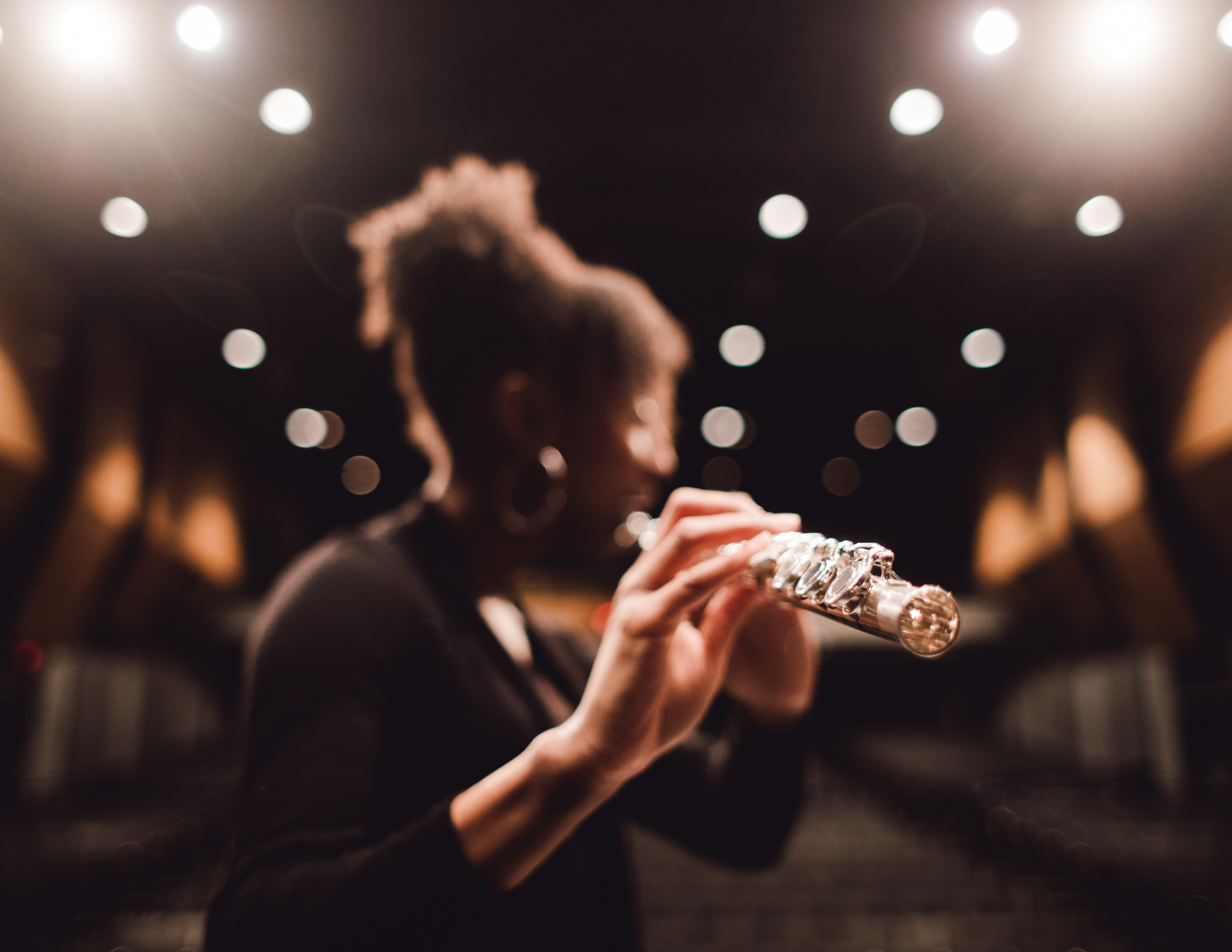 A student playing a musical instrument