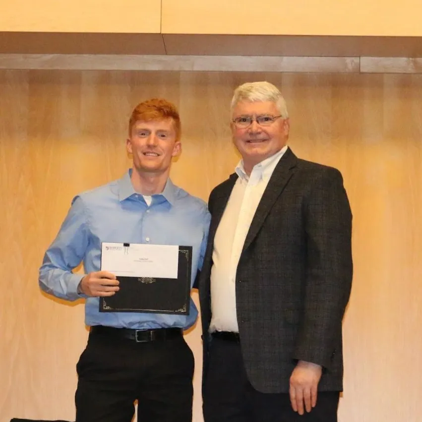 Outstanding Business Student Zachary Hall With Professor Daniel Barlow