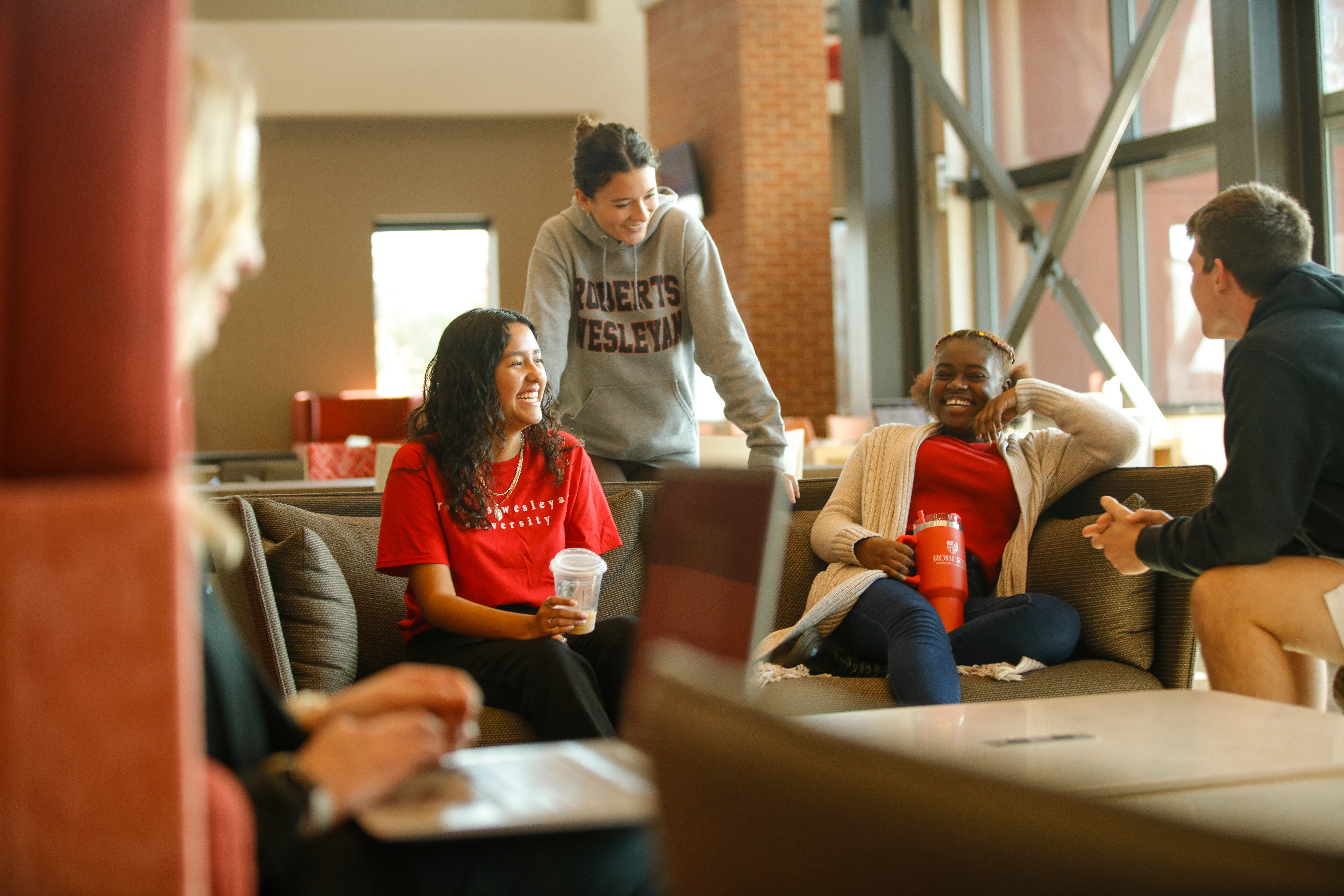 A group of happy Roberts Wesleyan University students